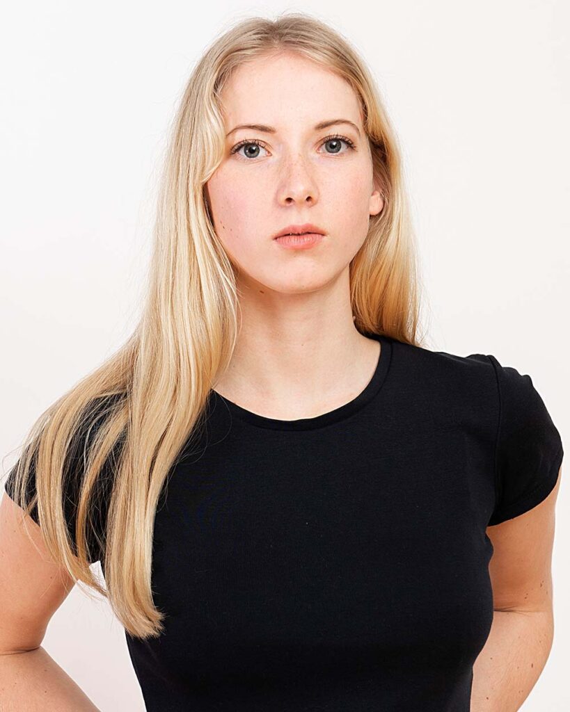 portrait of a young blonde woman isolated on a whi xqma6uz.jpeg